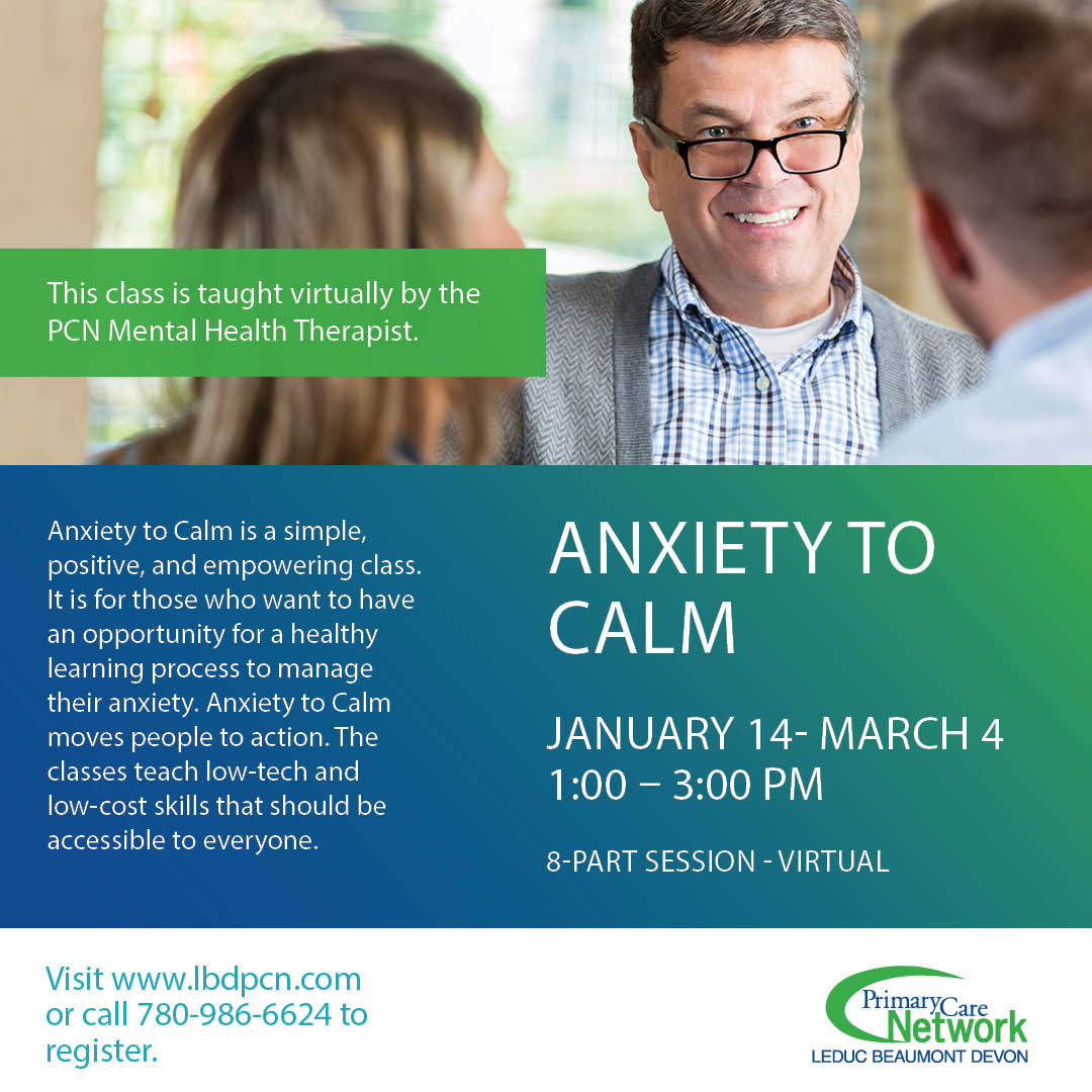 man with glasses smiling at two people